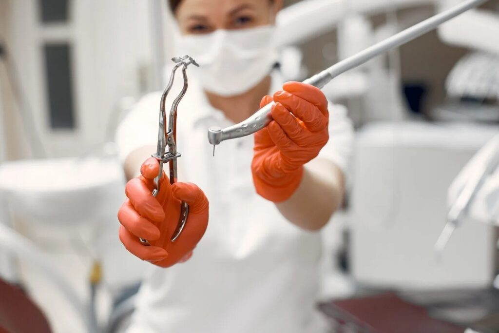 imgi 20 dentist is preparing reception doctor with his equipment woman looking camera 1157 40937 2880w